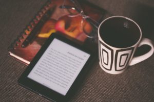 Ebook and coffee cup